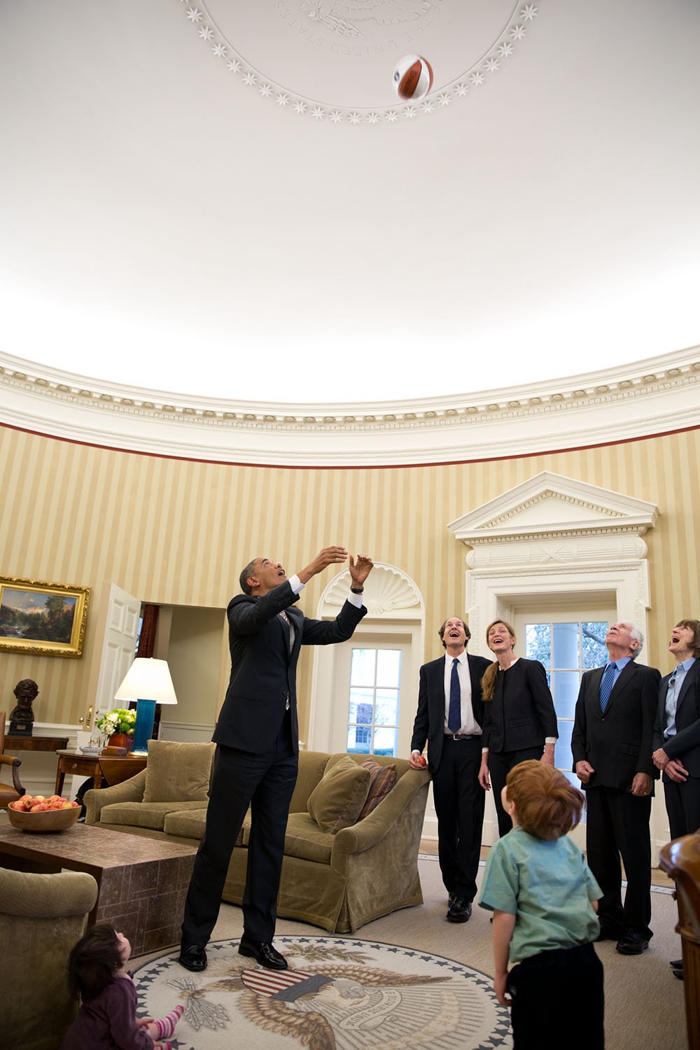 20170111obama4 © Feb. 22, 2013
« How high is that ceiling? The President showed Samantha Power and Cass Sunstein’s children just how high by throwing a basketball to see if he could touch the ceiling with it. »
(Official White House Photo by Pete Souza)
This official White House photograph is being made available only for publication by news organizations and/or for personal use printing by the subject(s) of the photograph. The photograph may not be manipulated in any way and may not be used in commercial or political materials, advertisements, emails, products, promotions that in any way suggests approval or endorsement of the President, the First Family, or the White House.