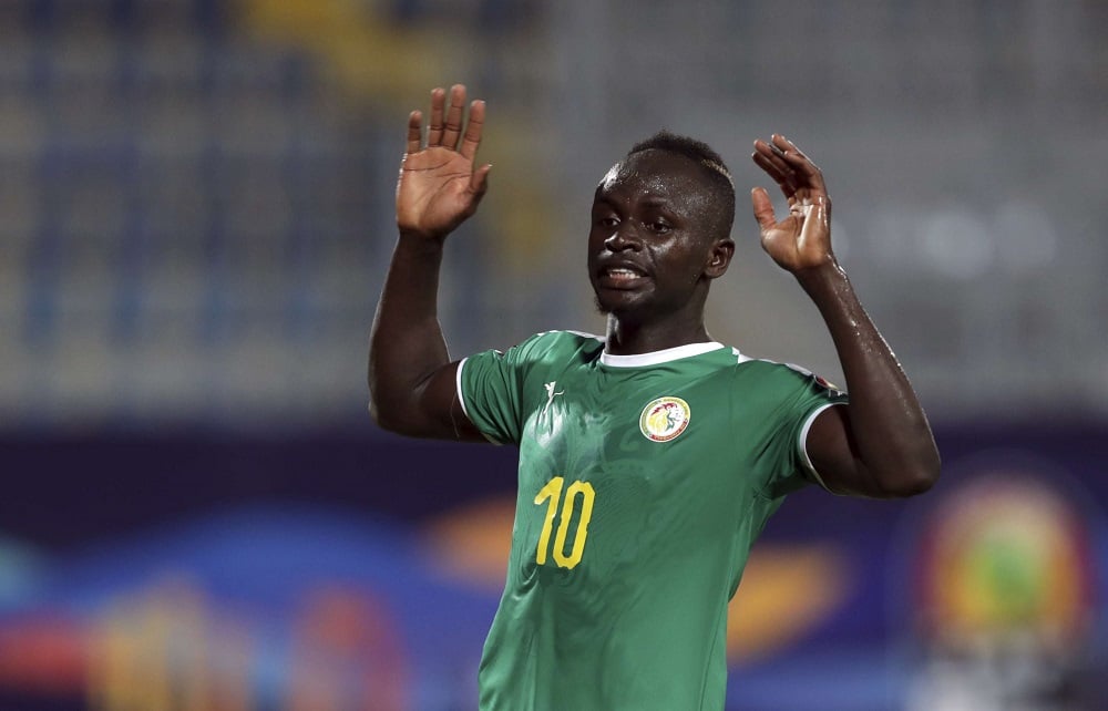 L'attaquant sénégalais Sadio Mané fête son ouverture du score face à l'Ouganda. &copy; Hassan Ammar/AP/SIPA