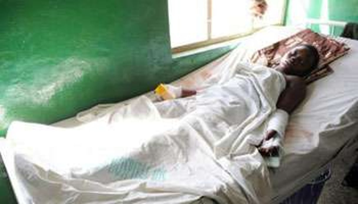 Une jeune femme nigériane blessée lors de violences à Jos, sur son lit d’hôpital © AFP