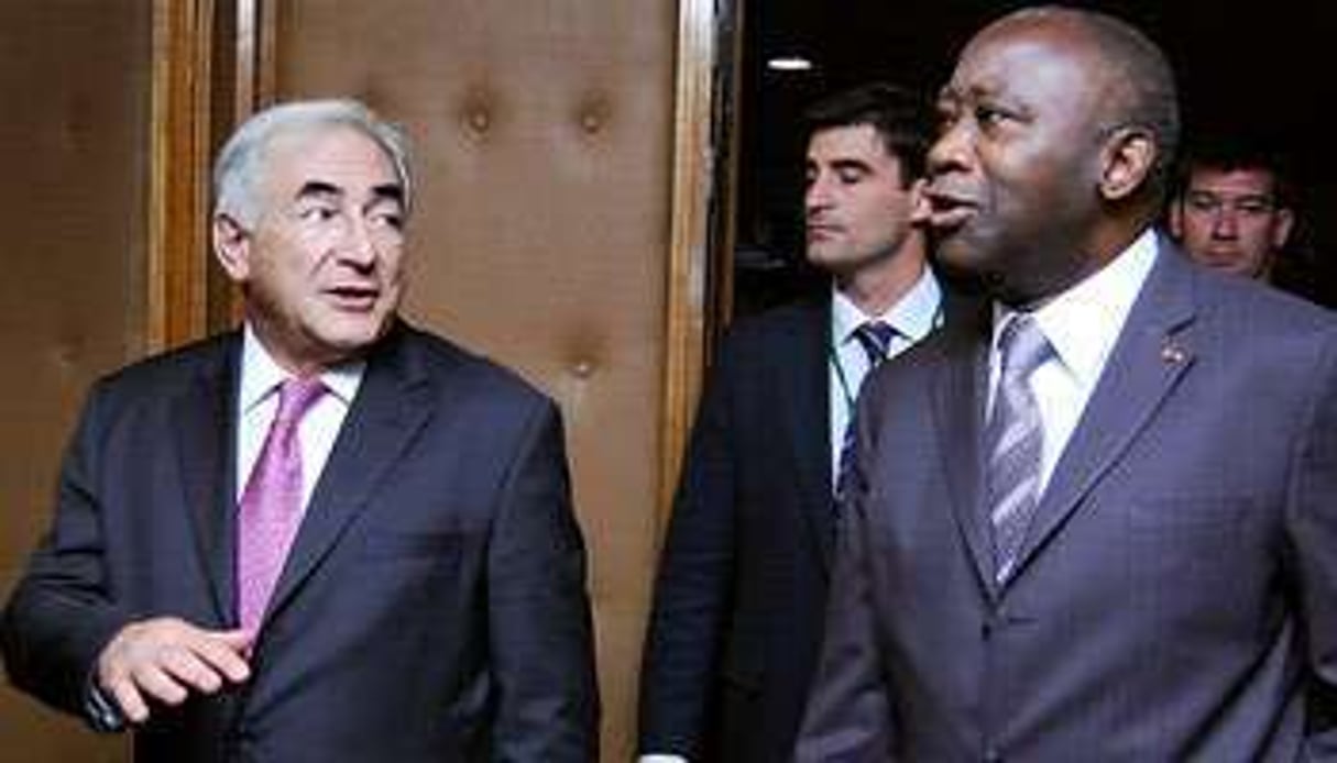 Dominique Strauss-Kahn, avec Laurent Gbagbo, en 2008 à Ouagadougou. © Imageforum