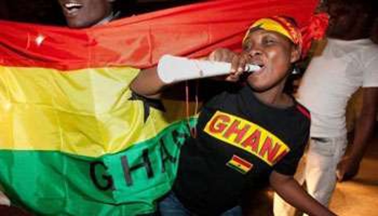 Des supporteurs du Ghana dans les rues de Johannesburg après la victoire contre les Etats-Unis. © AFP