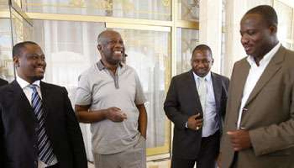 Le président Laurent Gbagbo, entouré de Guillaume Soro (à g.) et de Désiré Tagro (à d.). © Luc Gnago/Reuters