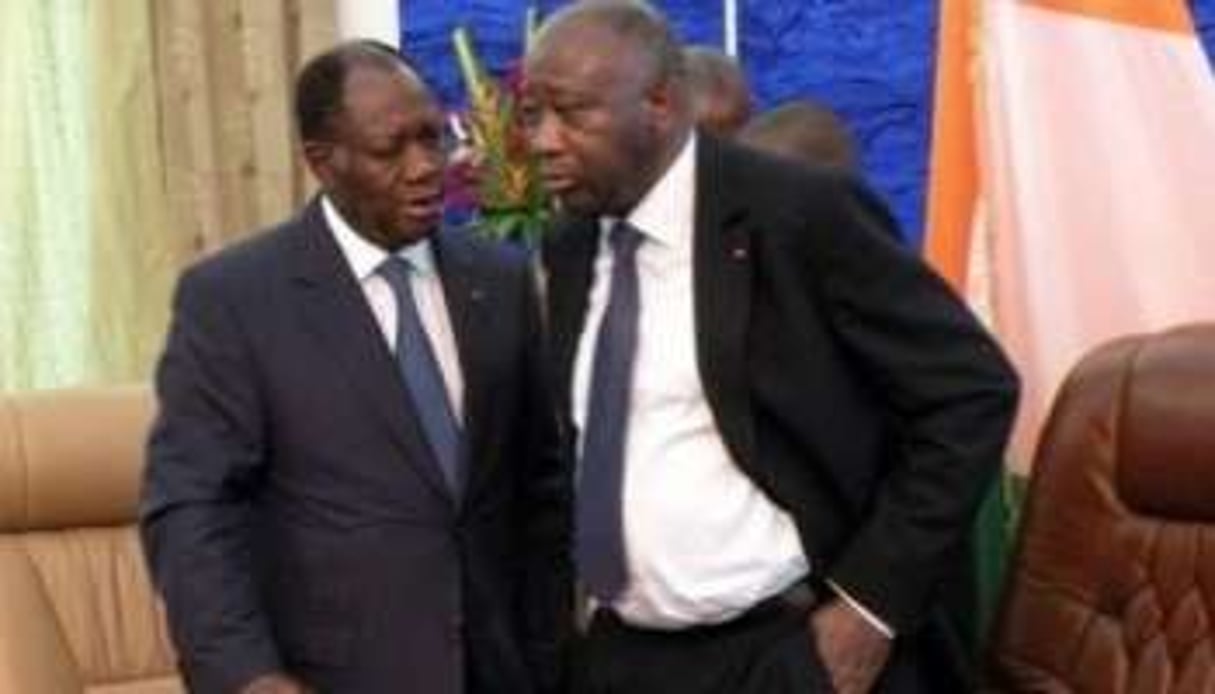 Laurent Gbagbo et Alassane Ouattara, le 21 septembre 2010 à Ouagadougou. © AFP