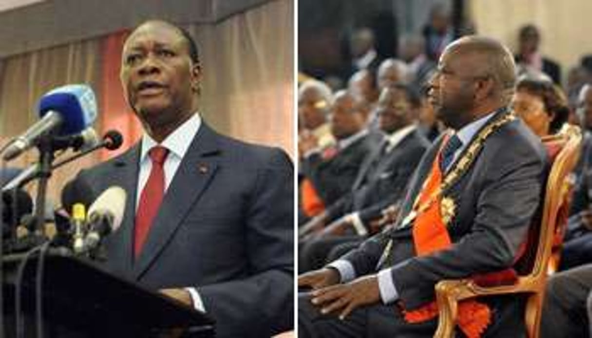 Alassane Ouattara (g.) et Laurent Gbagbo, le 4 décembre. © AFP