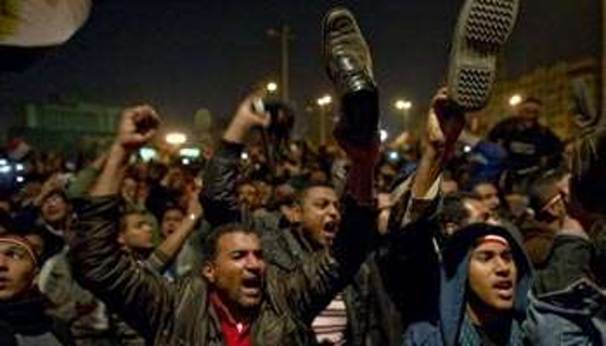 Manifestants en colère le 10 février 2011 place Al-Tahrir au Caire. © AFP