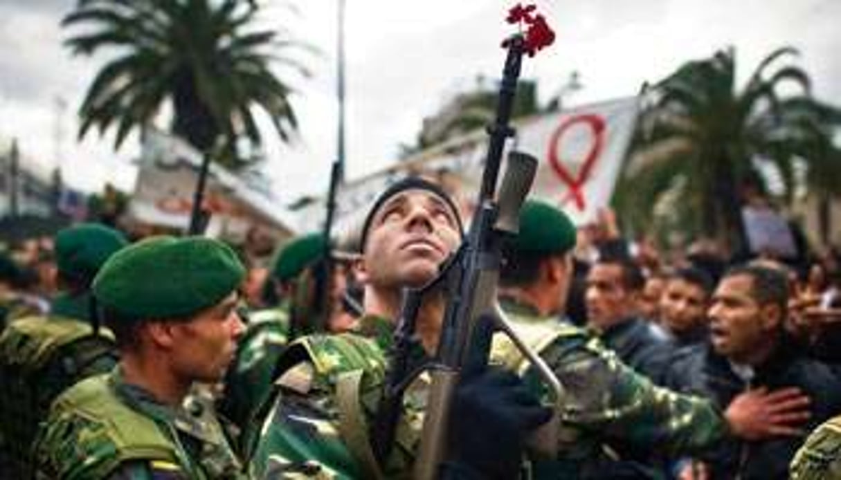 Lors d’une manifestation anti-RCD, le 20 janvier, à Tunis. © Martin Bureau/AFP