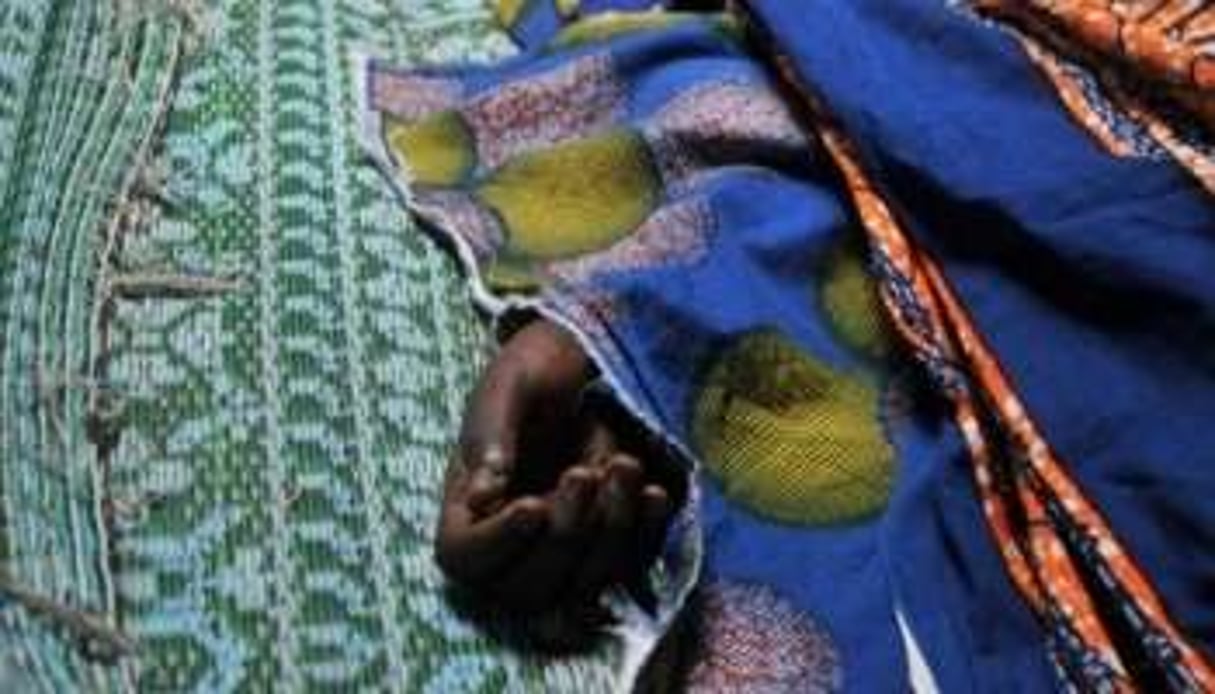 Le corps d’une jeune fille tuée à Abobo, le 11 mars 2011. © AFP