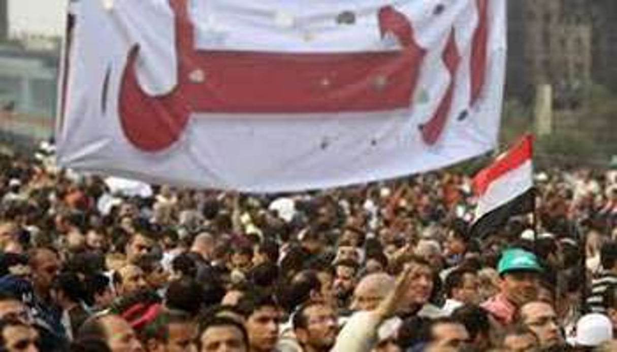 « Dégage ! », peut-on lire sur cette banderole, au Caire. © Khaled Desouki/AFP