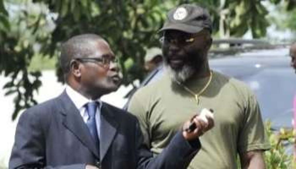 Simplice Kouadio Koffi (à gauche) et Fofié Kouakou, geôlier de Gbagbo à Korhogo. © AFP