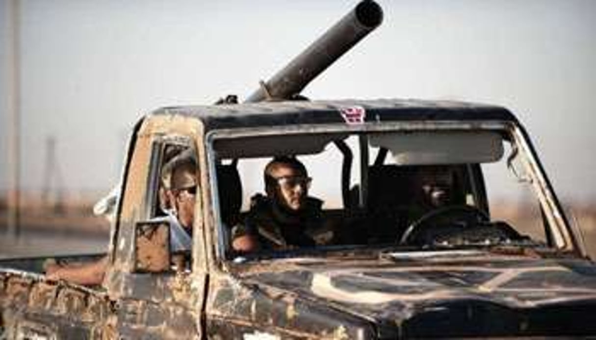 Des rebelles libyens à Ajdabiya, le 4 juillet 2011. © AFP