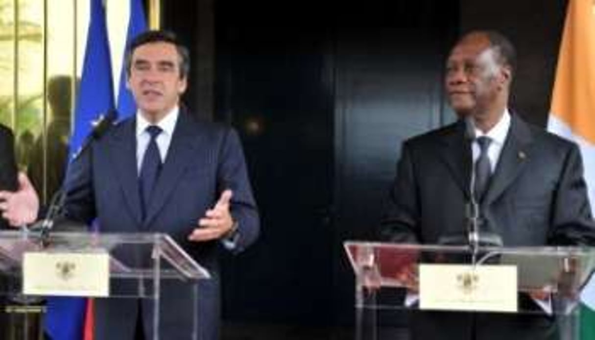 Le Premier ministre français François Fillonet le président ivoirien Alassane Ouattara au palais © AFP