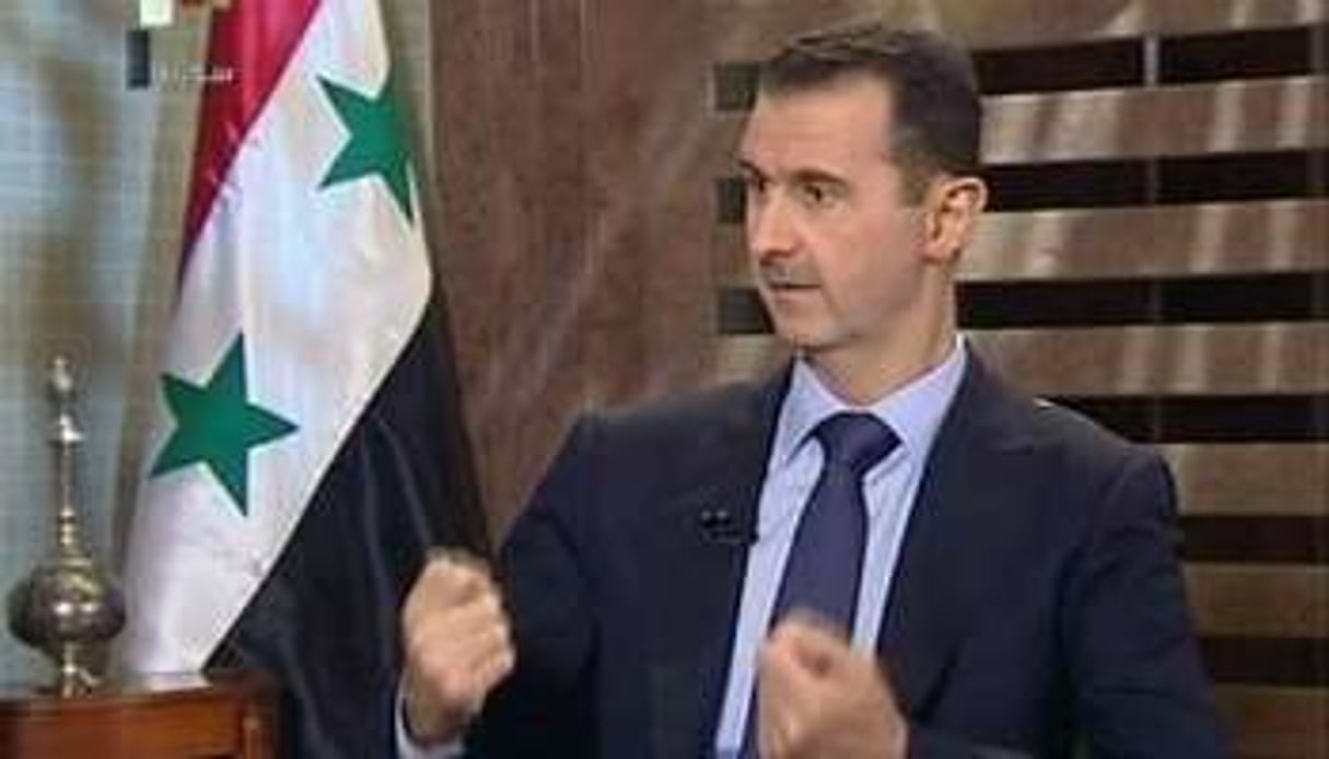 Dimanche soir, le président syrien Bachar el-Assad interviewé par la télévision d’Etat. © AFP