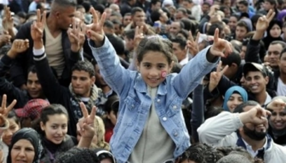Rassemblement de Tunisiens dans le square Mohamed Bouazizi, le 17 décembre 2011. © AFP