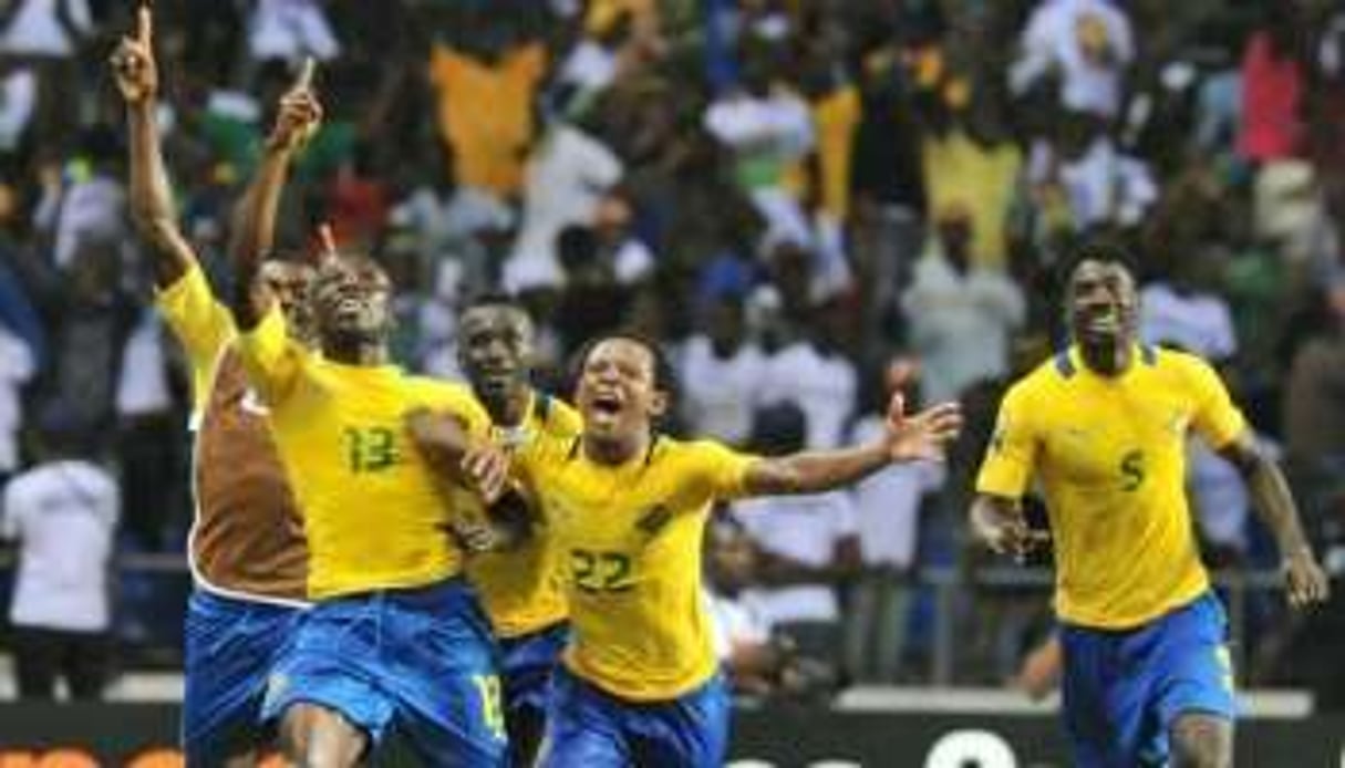 Les joueurs gabonais après le 3e but face au Maroc lors de la CAN, le 27 janvier à Libreville. © Issouf Sanogo/AFP