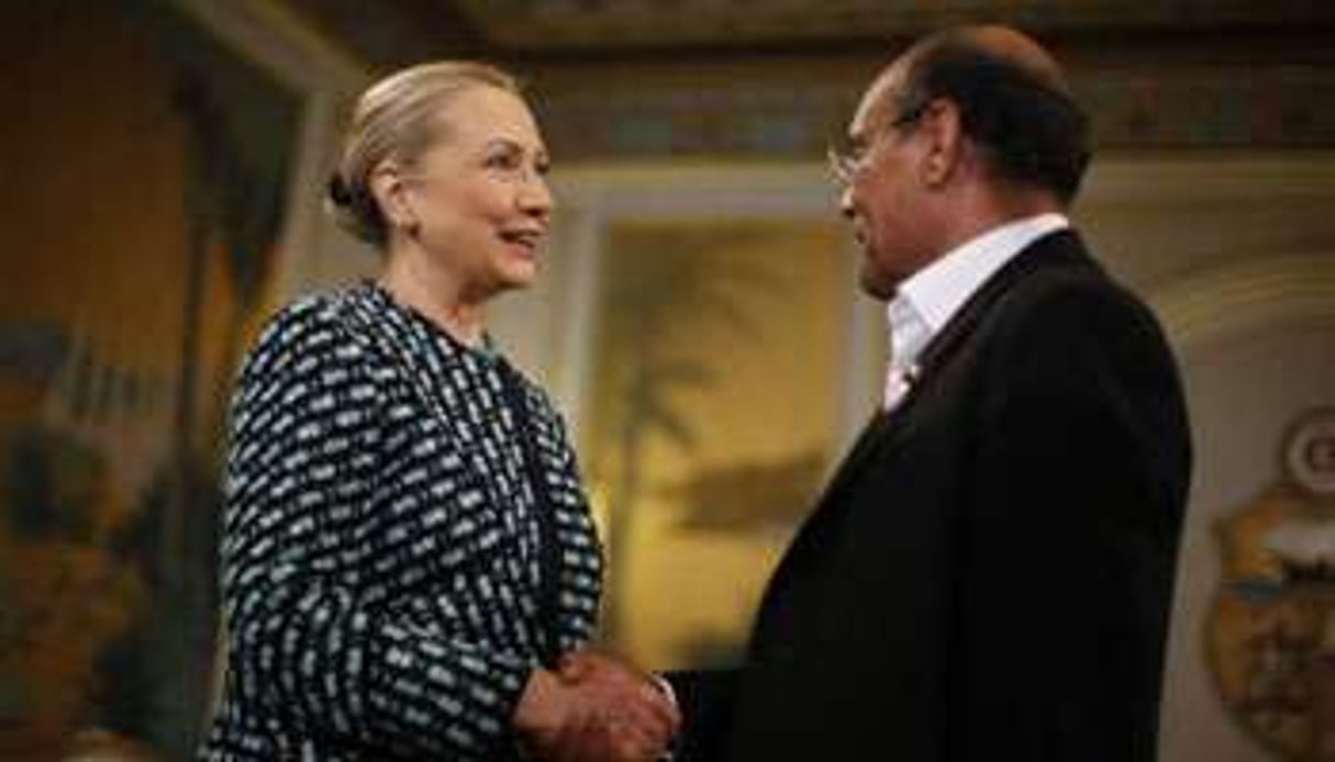 La secrétaire d’État américaine Hillary Clinton et le président tunisien Moncef Marzouki. © AFP