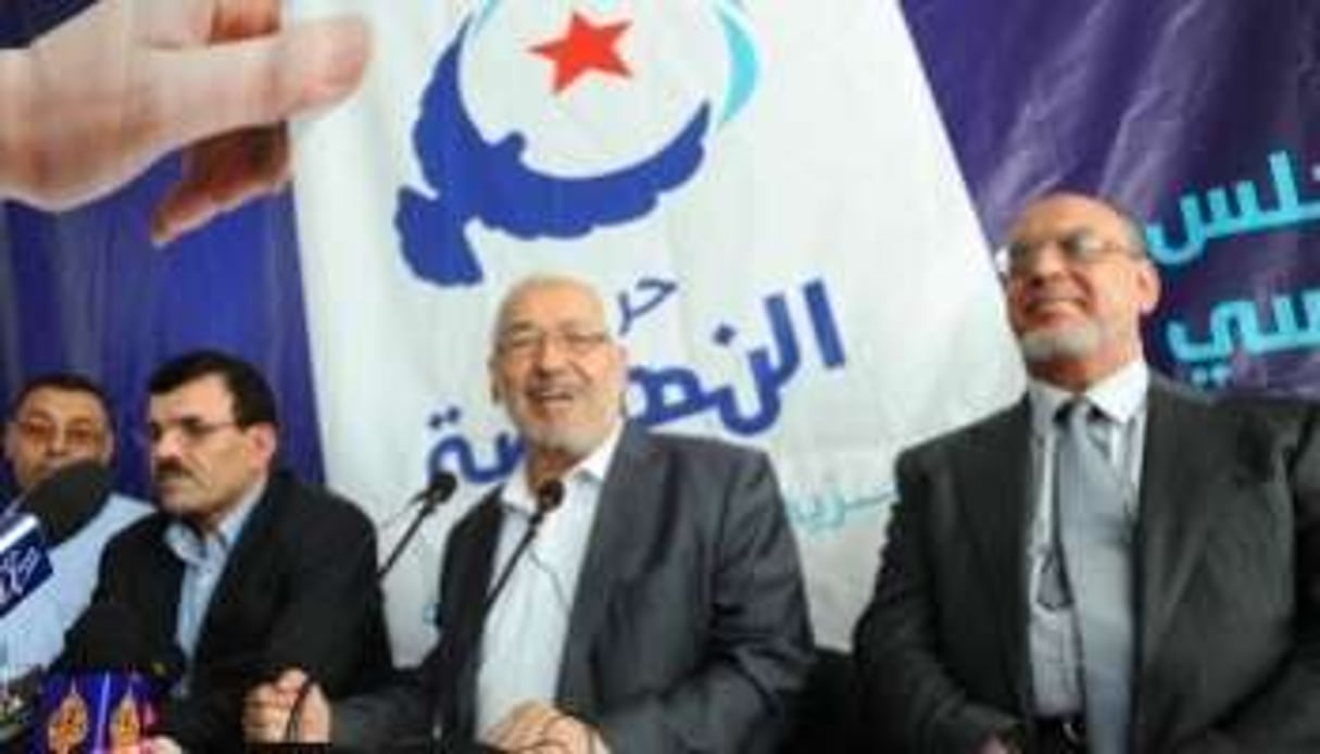 Rached Ghannouchi (C.) et Hamadi jebali (D.), les deux principaux leaders modérés d’Ennahdha. © Féthi Belaid/AFP