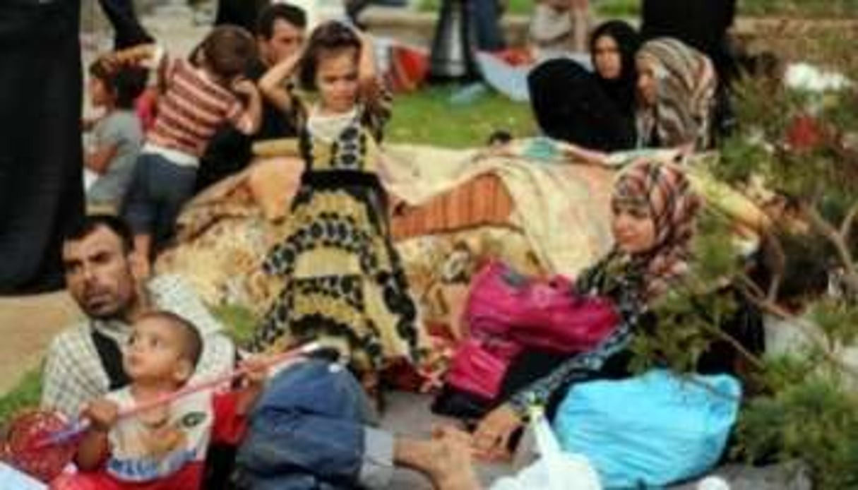 Des Syriens réfugiés à Port Saïd, en Algérie, le 28 juillet 2012. © Farouk Batiche/AFP