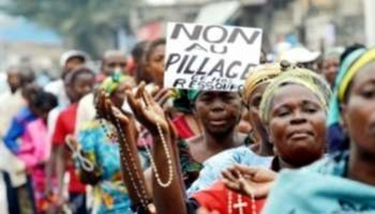 Le leitmotiv des marcheurs : « Non au pillage des ressources » et à la « balkanisation de la RDC ». © Junior D.Kannah/AFP