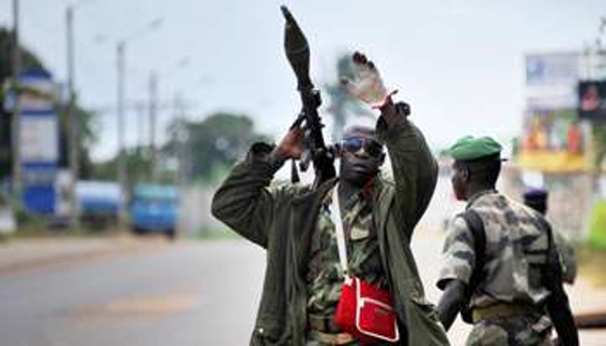 Patrouille des FRCI, à Dabou, le 16 août. © AFP