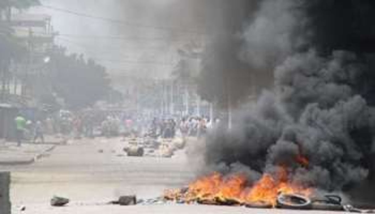 Affrontement entre opposants et policiers à Lomé le 21 août. © AFP