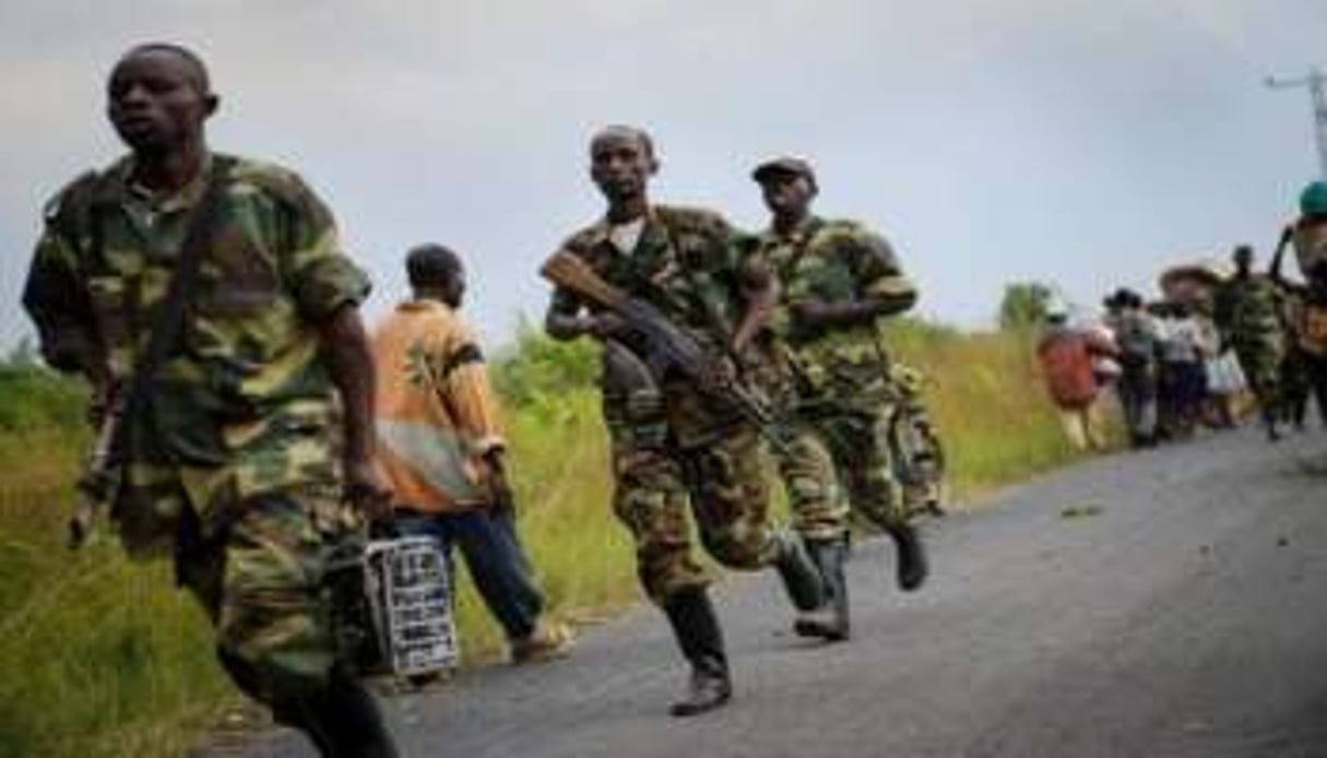 Des rebelles du M23, lors des combats aux abords de Saké. © AFP