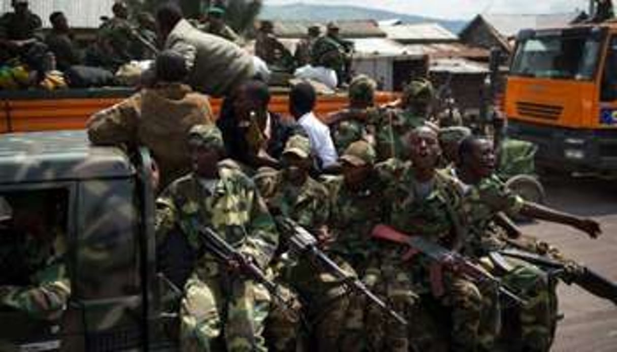 Des rebelles du M23 se retirent de Goma, le 1er décembre 2012. © Phil Moore/AFP