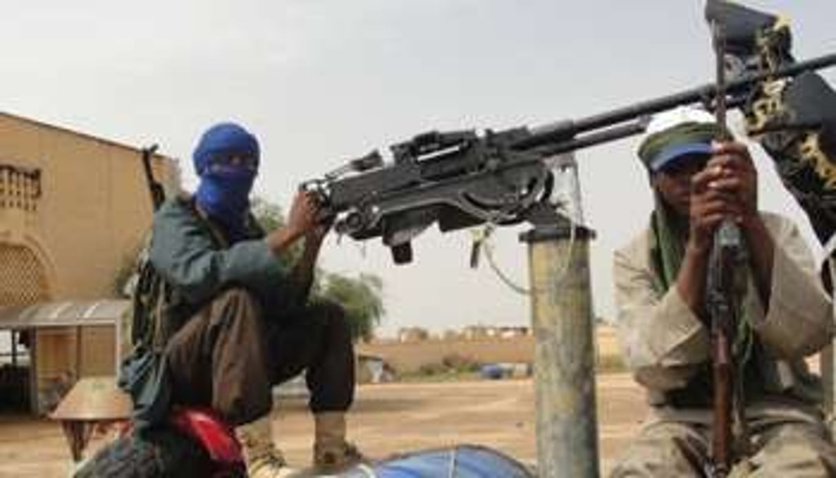 Des combattants du groupe islamiste du Mujao, près de Gao, dans le nord du Mali, le 7 août 2012. © AFP