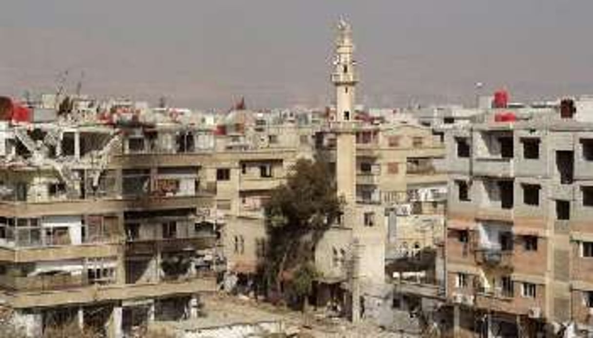 Photo fournie par l’agence Sana le 26 janvier 2013 d’immeubles détruits à Daraya. © Sana/AFP