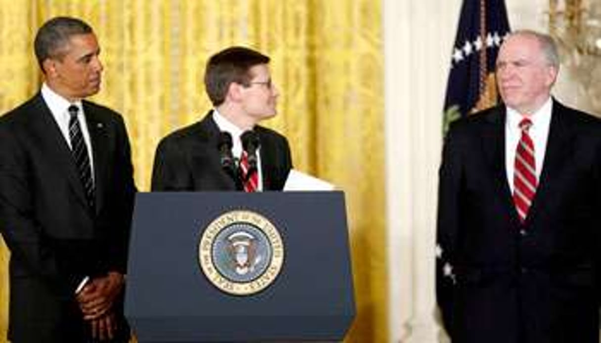 John Brennan (à dr.) avec le président et Michael Morell, directeur intérimaire, le 7 janvier. © SIPA