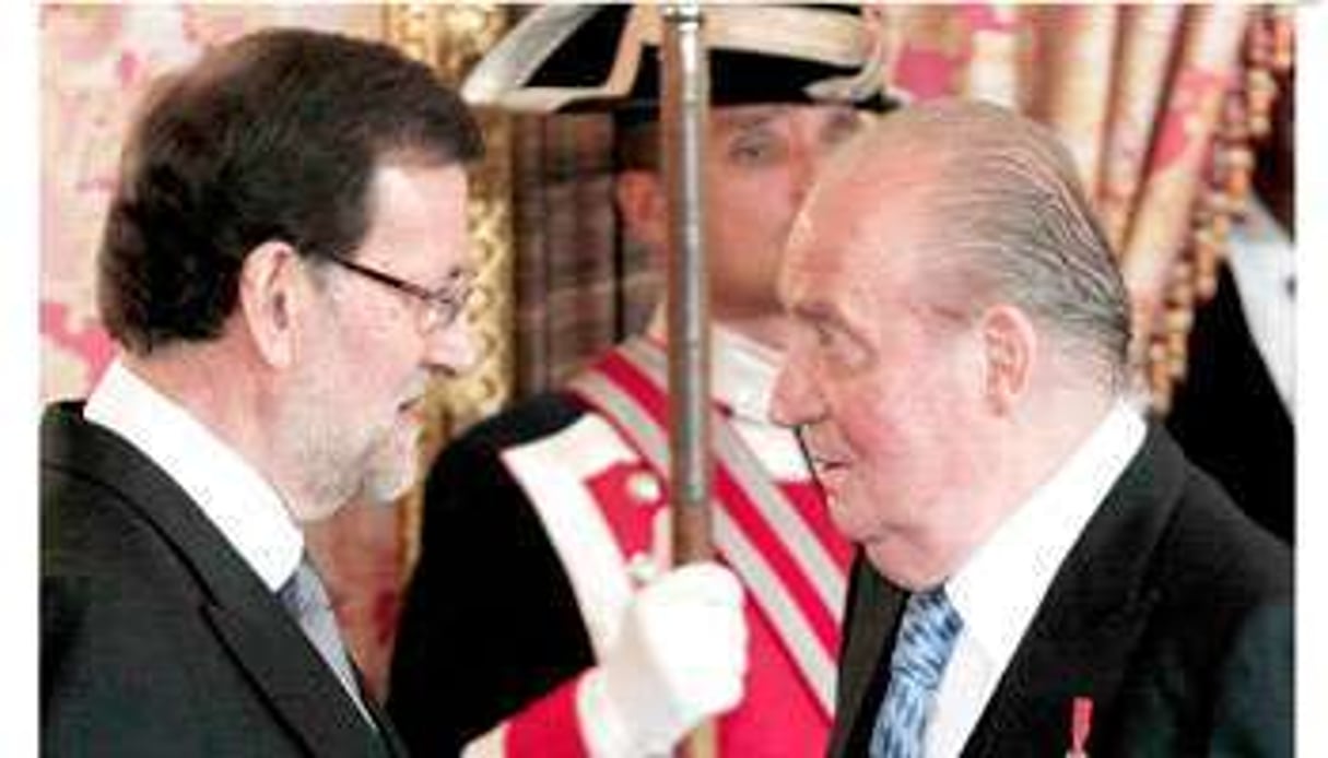 Juan Carlos (à dr.) recevant Mariano Rajoy, le 23 janvier au palais de la Zarzuela, à Madrid. © Sipa