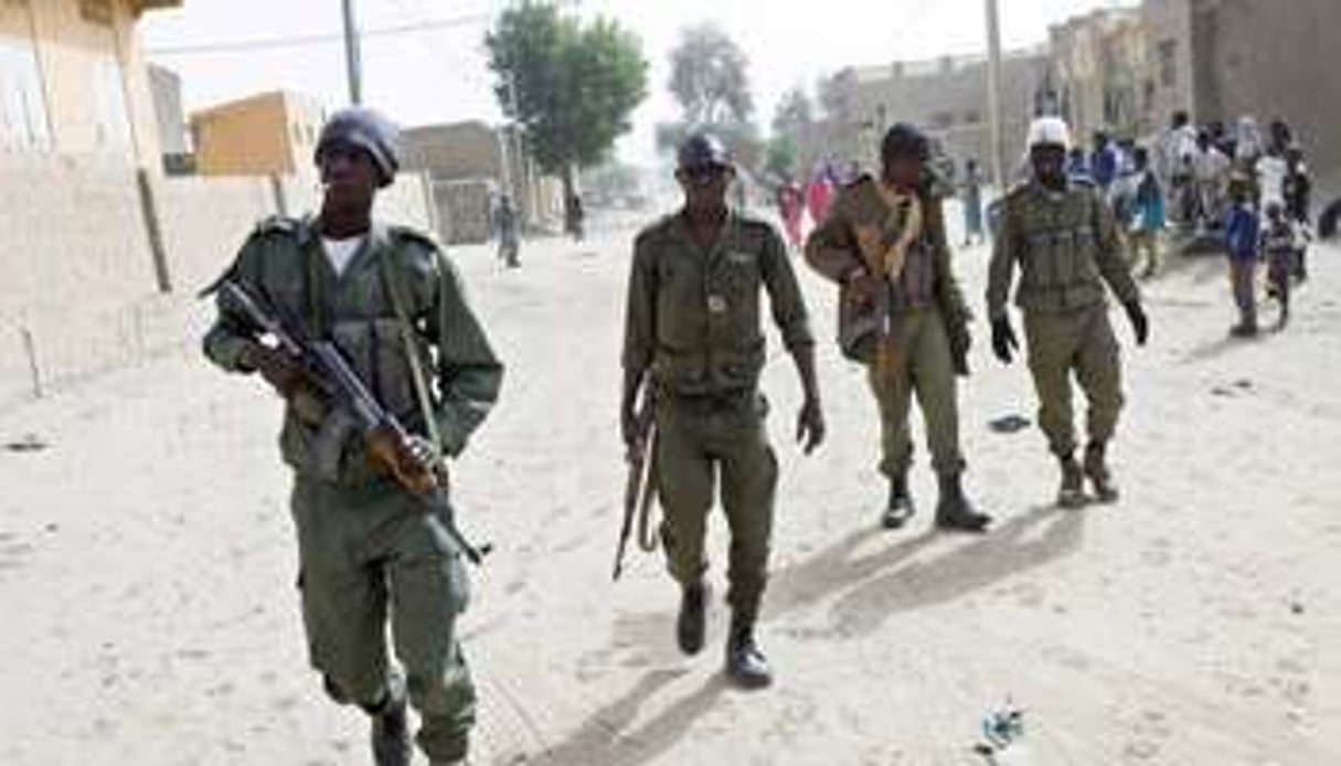 Des soldats maliens patrouillent à Tombouctou, le 1er février 2013. © Fred Dufour/AFP/Archives