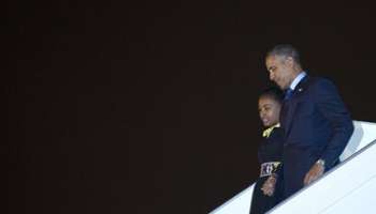 Le président américain et sa fille à l’aéroport de Dakar le 26 juin 2013. © AFP