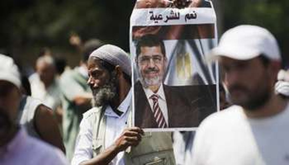 Des partisans du président déchu Mohamed Morsi manifestent au Caire, le 5 juillet 2013. © Gianluigi Guercia/AFP