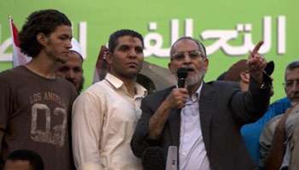 Le guide suprême des Frères musulmans, Mohamed Badie (d), le 5 juillet 2013 au Caire. © AFP
