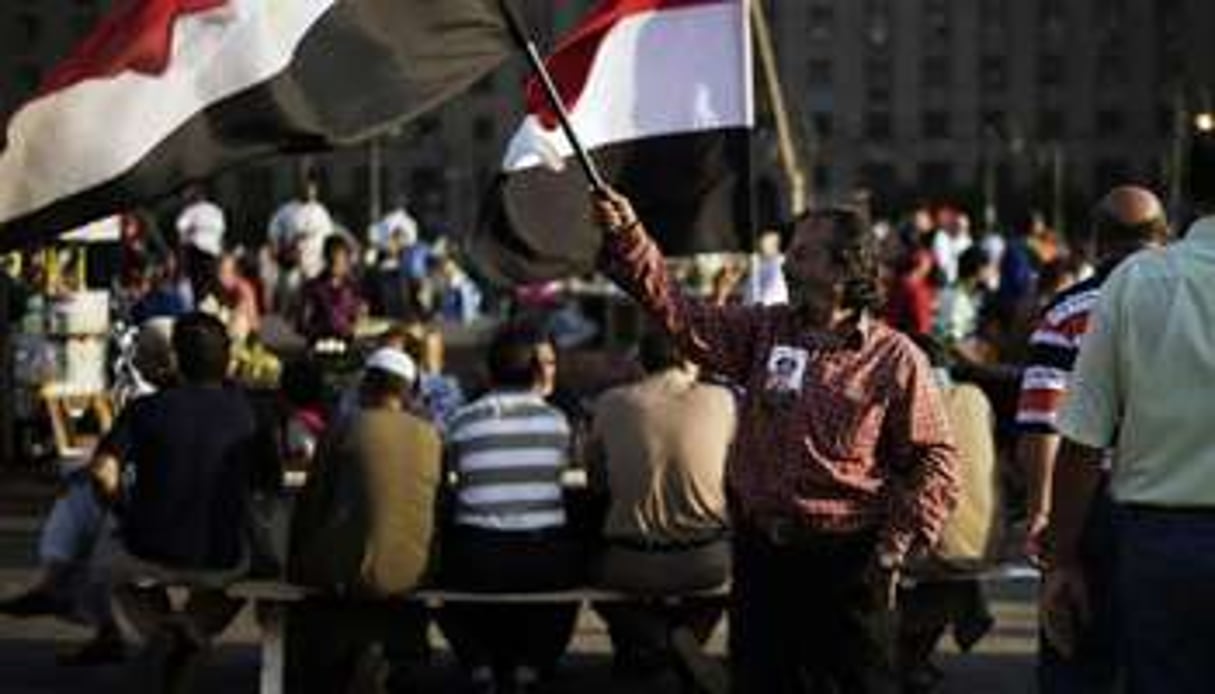 Un opposant à Mohamed Morsi, le 12 juillet sur la place Tahrir au Caire. © AFP