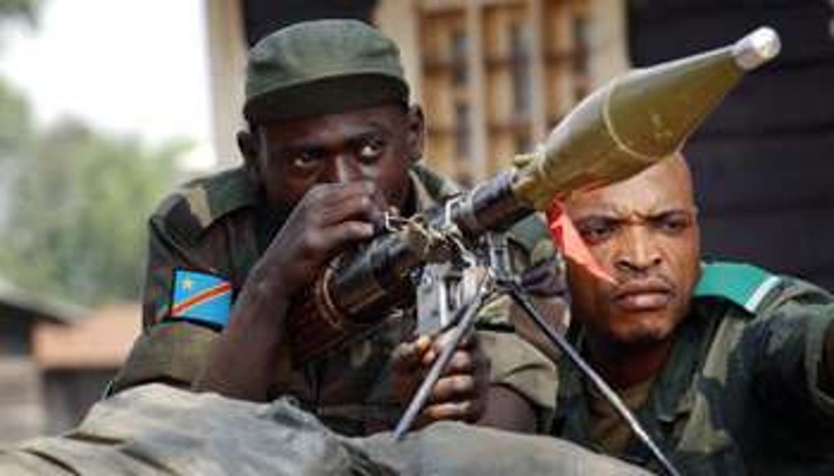 Des officiers des FARDC le 24 juillet 2013 à Kanyaruchinya, à 15km de Goma. © AFP
