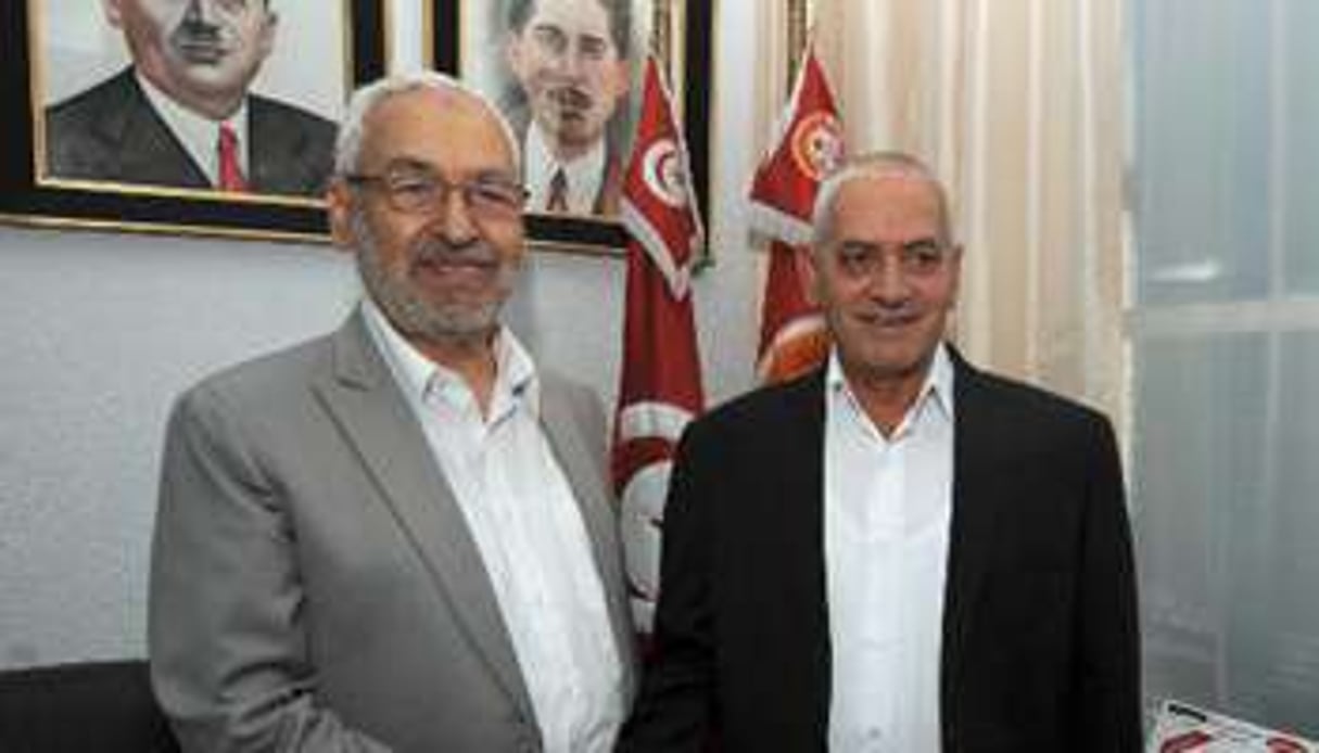 Le chef du parti tunisien Ennahdha (g), et le secrétaire général de l’UGTT, le 12 août 2013 à T © AFP