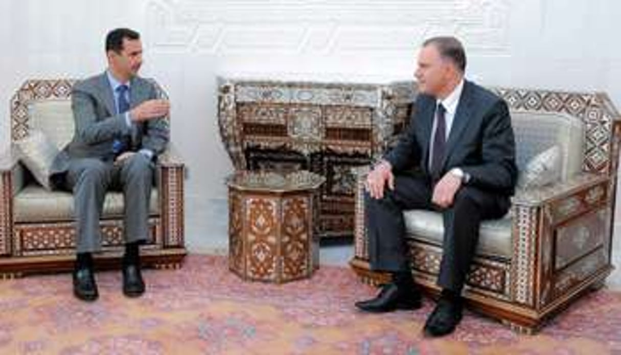 Anas Abdel Razzaq al-Naëm, gouverneur de Hama, avec Bachar al-Assad. © AFP