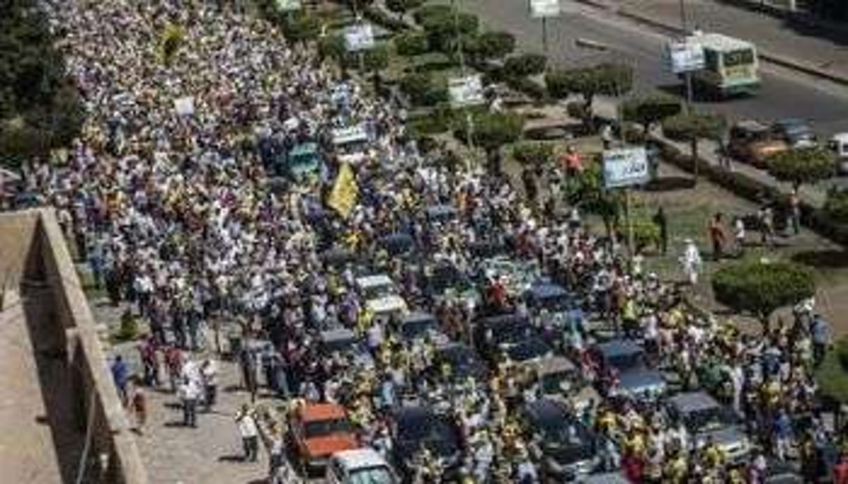Des partisans de Morsi,le 13 septembre 2013 dans les rues du Caire. © AFP