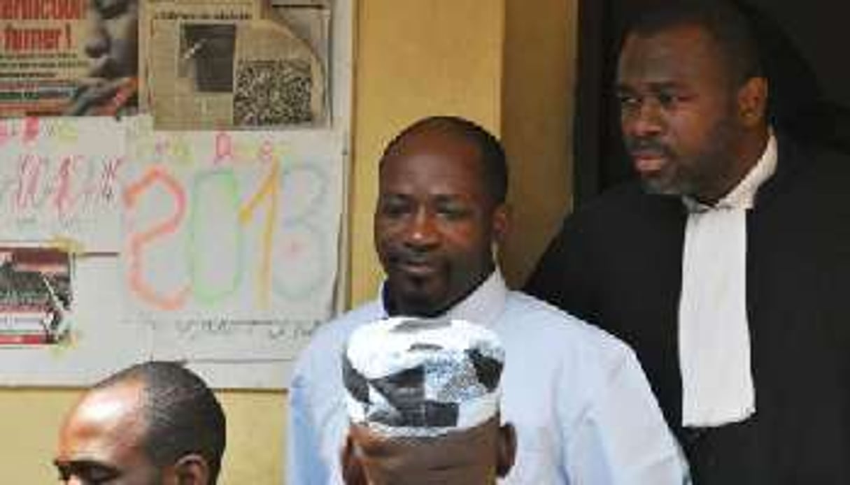 Charles Blé Goudé sort d’un tribunal d’Abidjan, le 30 janvier 2013. © AFP