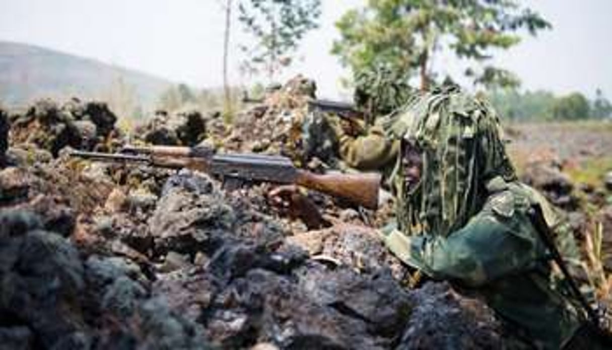 Des soldats des FARDC déployés près de Munigi, dans l’est de la RDC, le 15 juillet 2013. © AFP
