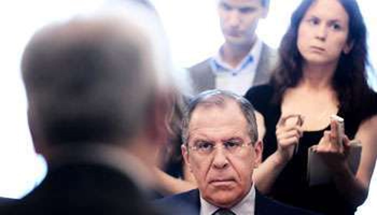 Sergueï Lavrov avec des émissaires du Conseil national syrien à Moscou, en 2012. © NATALIA KOLESNIKOVA/AFP