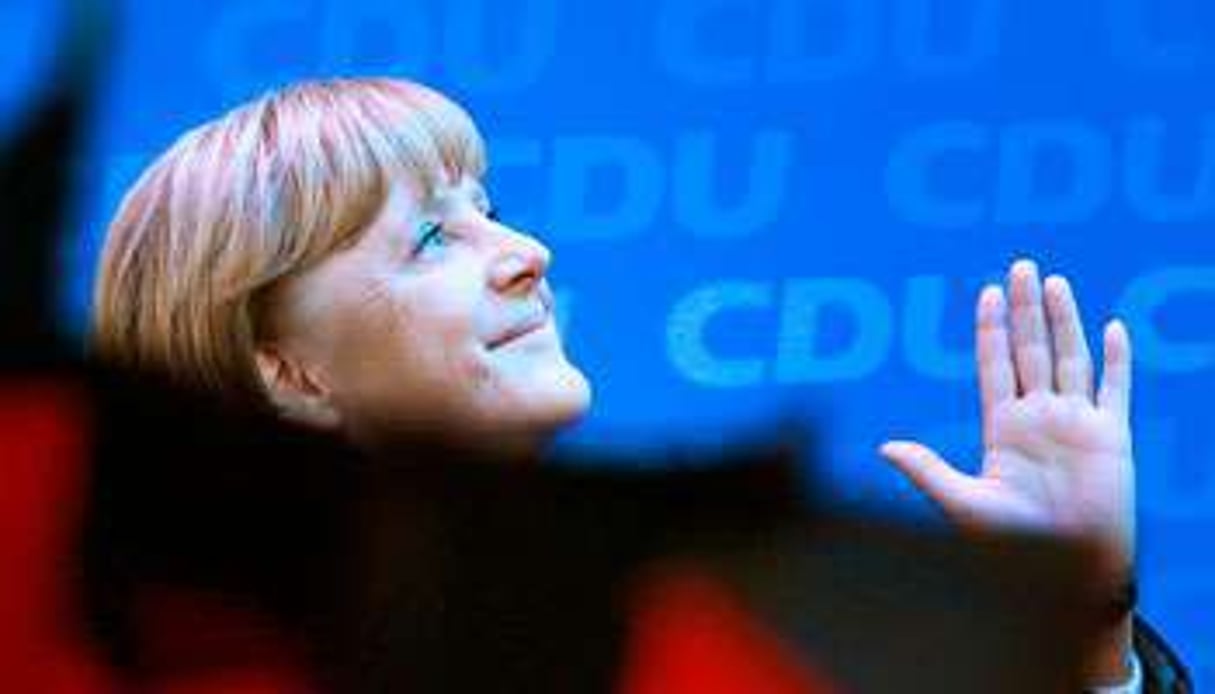 Victoire écrasante d’Angela Merkel le 22 septembre (ici au QG de la CDU, à Berlin). © Michael Kappeler/AFP