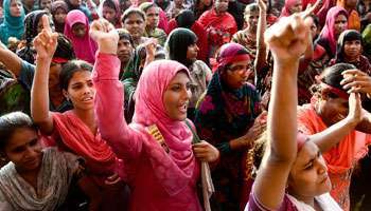 Manifestation d’ouvrières du textile, le 21 septembre à Dacca, la capitale du Bangladesh. © Munir Uz Zaman/AFP
