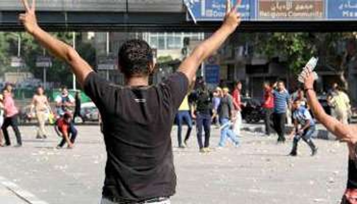 Heurts entre partisans et opposants du président déchu Mohamed Morsi, le 4 octobre 2013 au Caire. © AFP