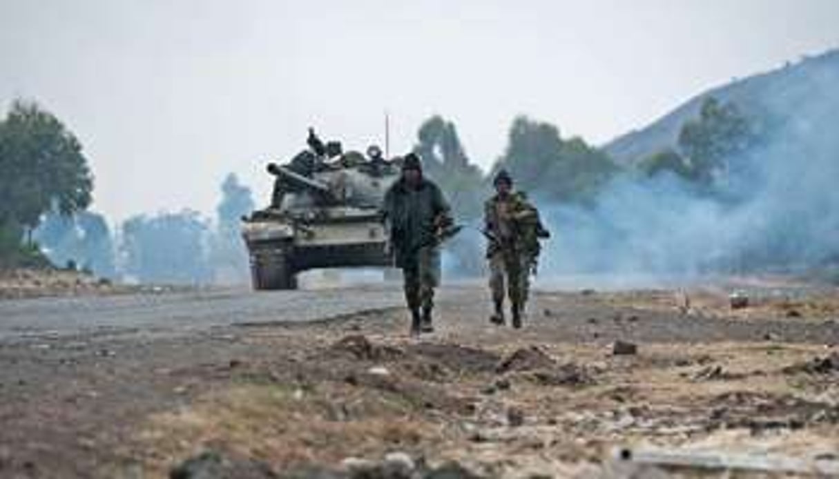 Des soldats des FARDC à Kanyarucinya, le 17 juillet, dans l’est de la RDC. © AFP/Phil Moore