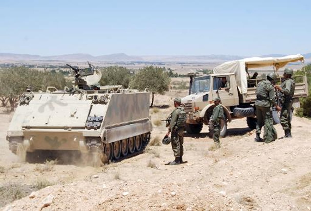 Des soldats tunisiens lors d’une opération le 11 juin 2013 dans la région du Mont Chaambi. © AFP