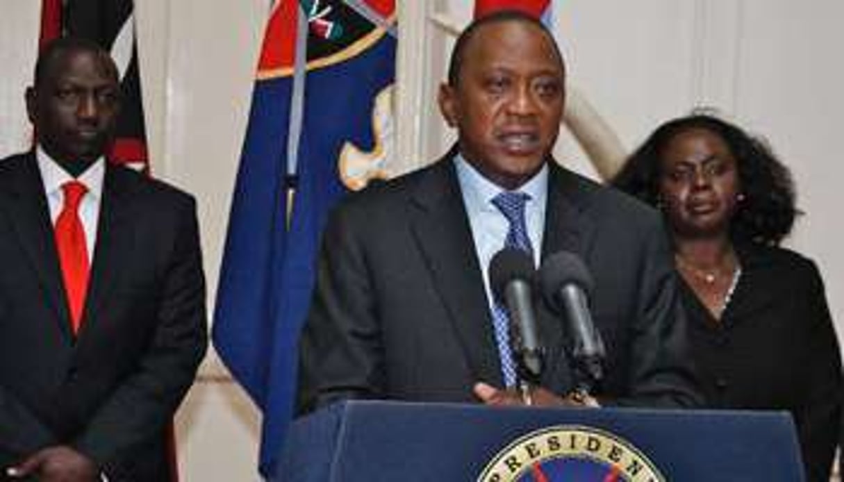 Le président Uhuru Kenyatta (c) et le vice-président William Ruto (g) à Nairobi, le 24 septembre. © AFP