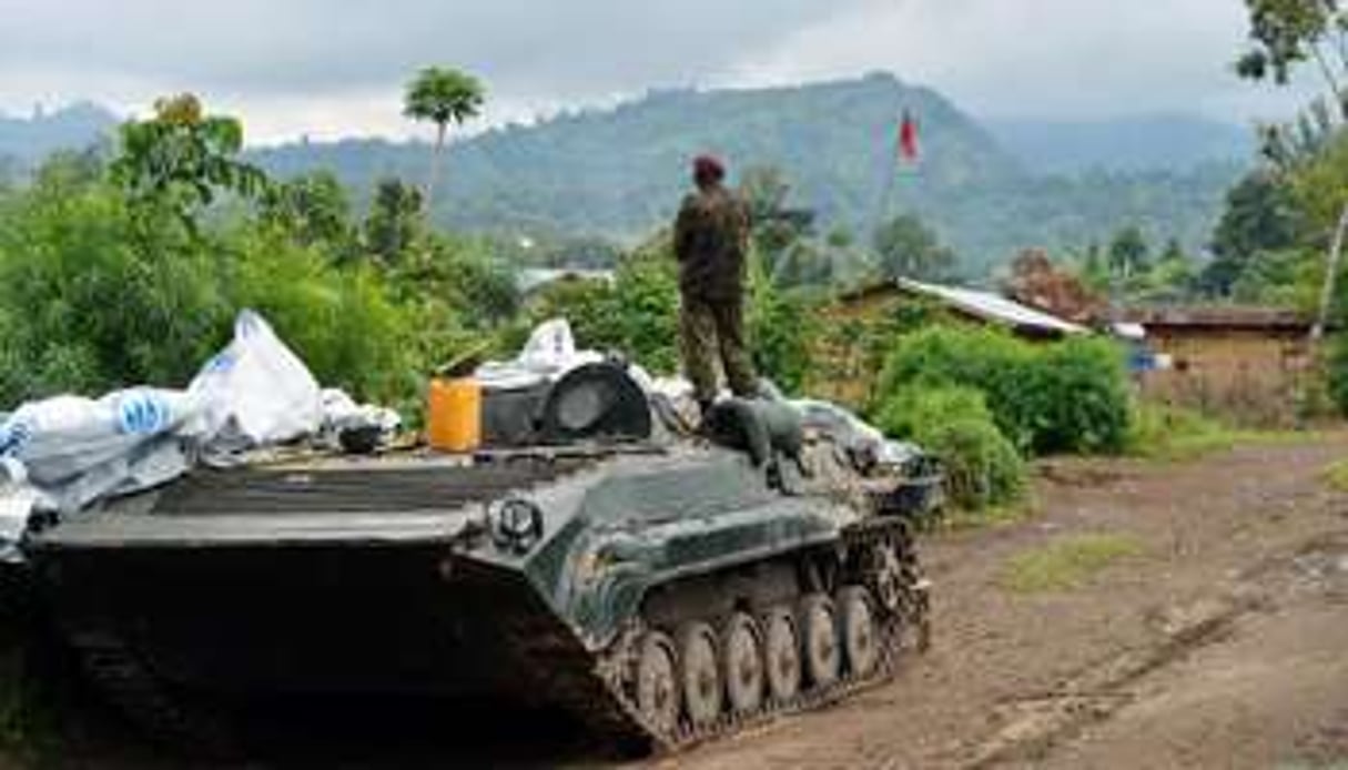 Des soldats congolais près de la colline de Mbuzi le 4 novembre 2013, dans l’Est de la RDC. © AFP/Junior D.Kannah