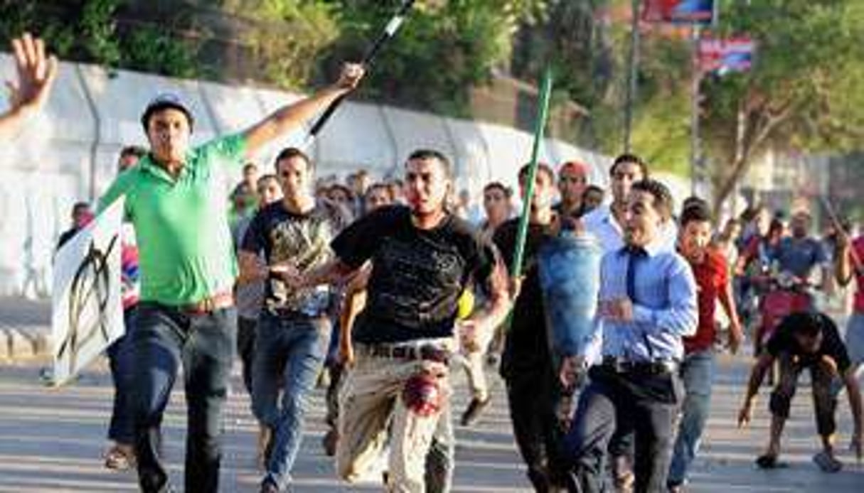 Des partisans du président Mohamed Morsi dans les rue du Caire en juillet. © AFP